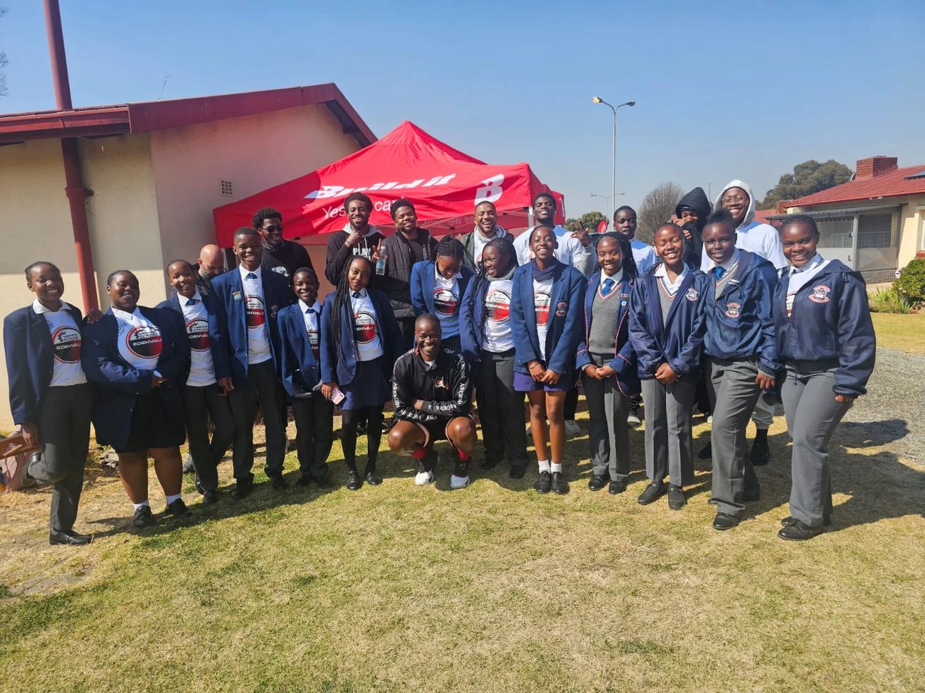 Community members gathered together at a basketball event
